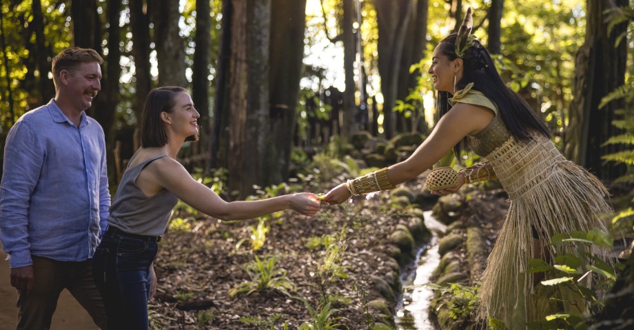 Tourists experiencing Māori culture