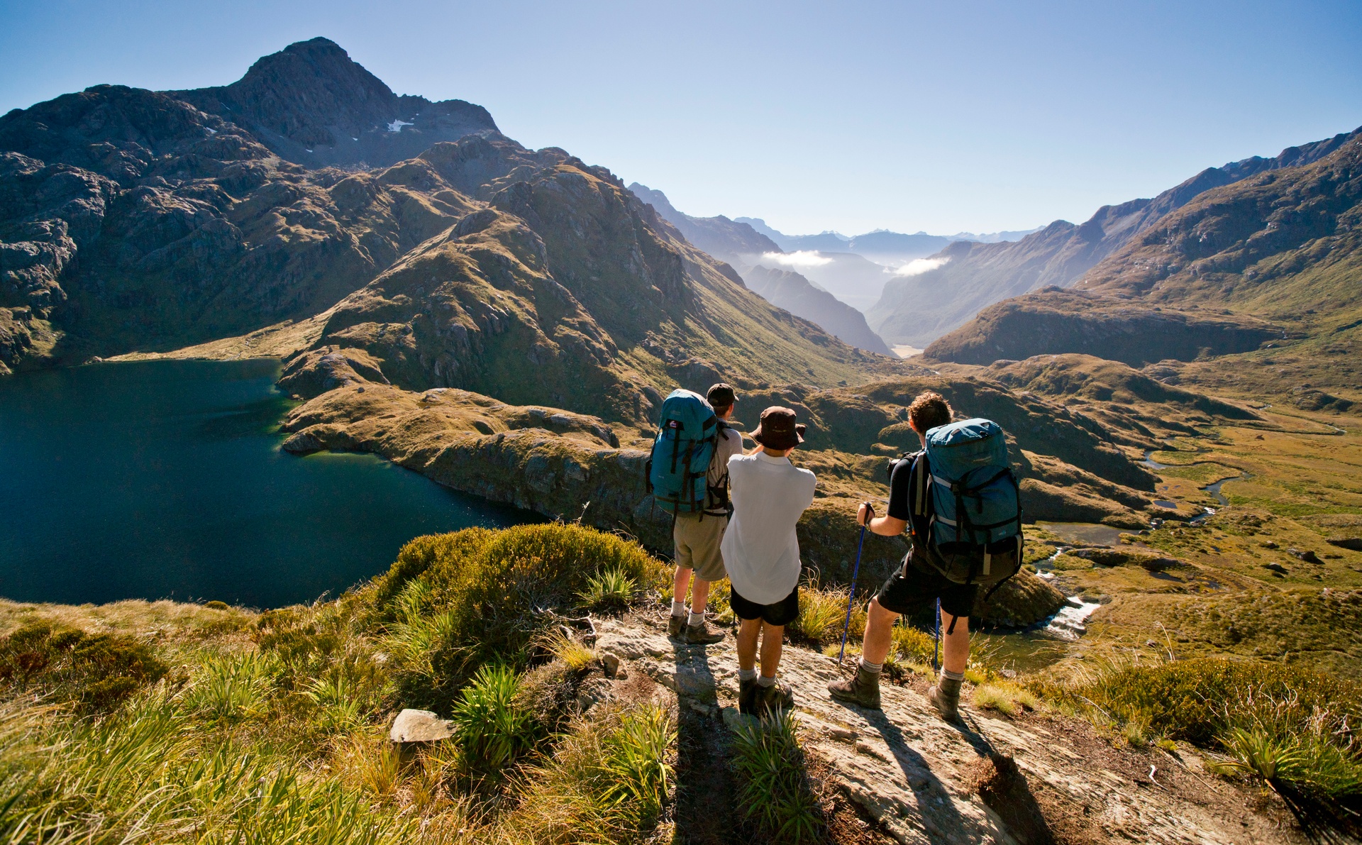 Hikers enjoying scenery on Routeburn Track